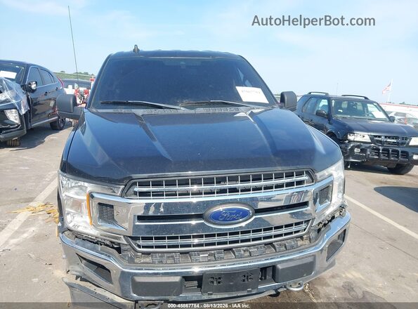 1FTEW1EP2LFA10398 2020 FORD F150 Black Widok wnętrza z tyłu