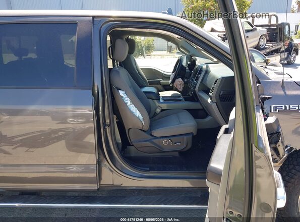 1FTEW1EP3JKF12499 2018 FORD F150 Серый Вид салона спереди