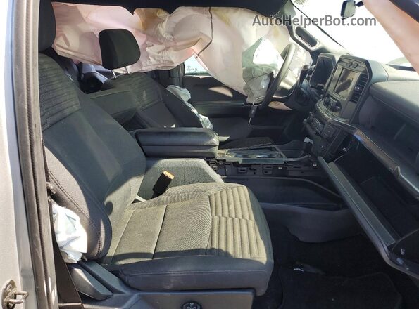 1FTEW1EP4PKE64830 2023 FORD F150 Silver Widok wnętrza z przodu