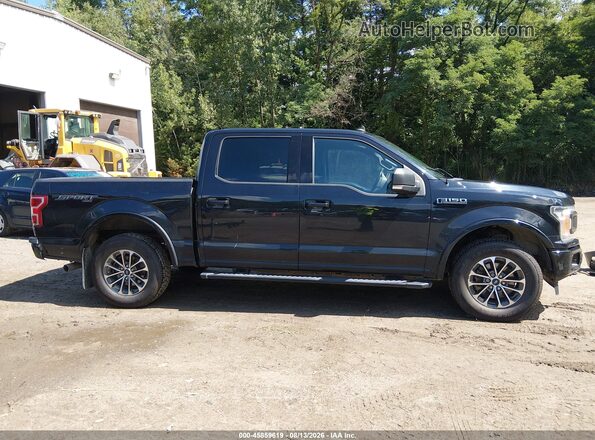 1FTEW1EP7KFD47843 2019 FORD F150 Black Widok wnętrza z tyłu