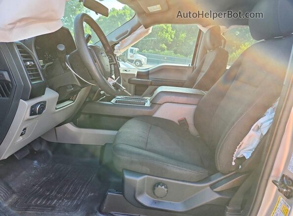1FTEW1EP8KFD51657 2019 FORD F150 Silver Front interior view