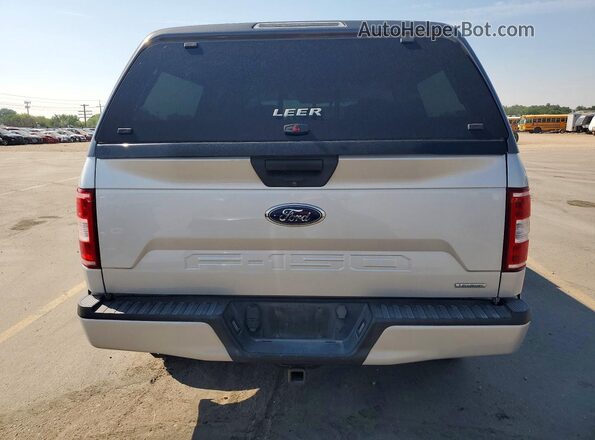 1FTEW1EP9KKE94401 2019 FORD F150 Серебряный Вид сзади
