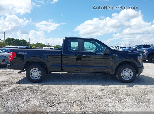 1FTEX1EB9PKF80624 2023 FORD F150 Black Widok wnętrza z tyłu