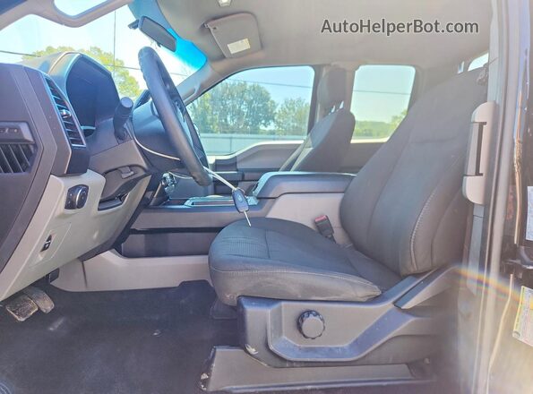 1FTEX1EP1JFE07997 2018 FORD F150 Black Vista interior delantera