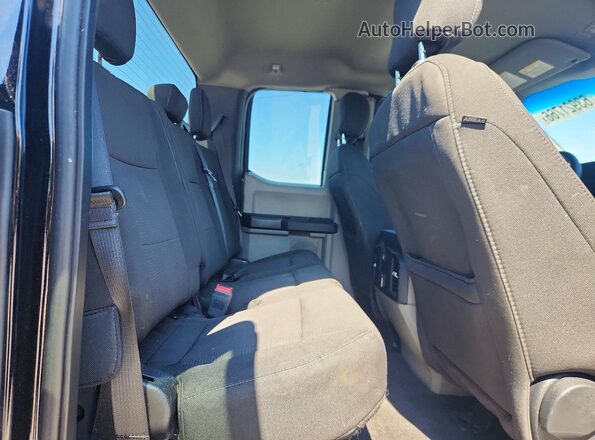 1FTEX1EP1JFE07997 2018 FORD F150 Black Vista de los asientos traseros
