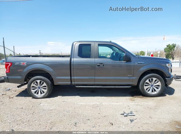 1FTEX1EP9HFC29329 2017 FORD F150 Gray Vista interior trasera