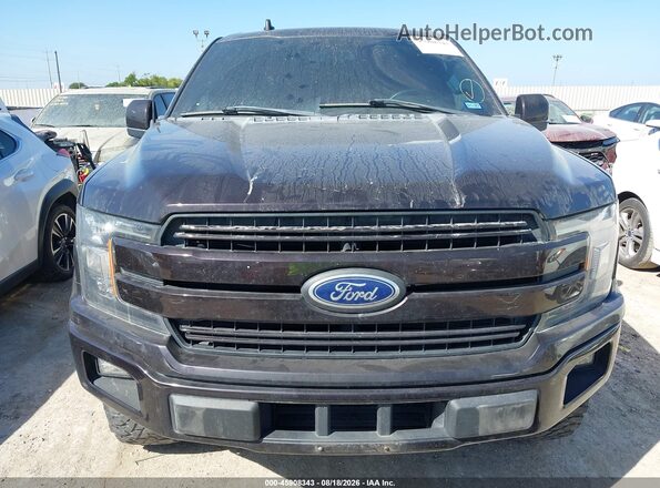 1FTFW1E14JFD73024 2018 FORD F150 Черный Вид щитка приборов