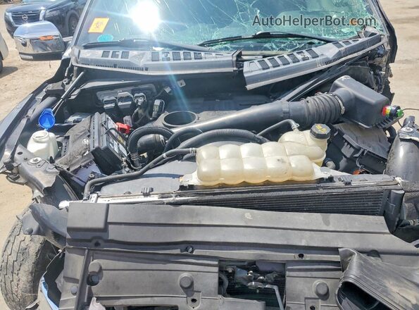 1FTFW1E16JFD73025 2018 FORD F150 Gray Vista interior trasera