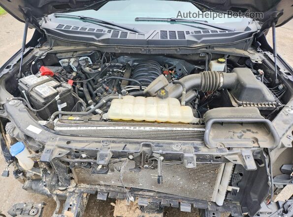 1FTFW1E55PKE73975 2023 FORD F150 Black Rear interior view