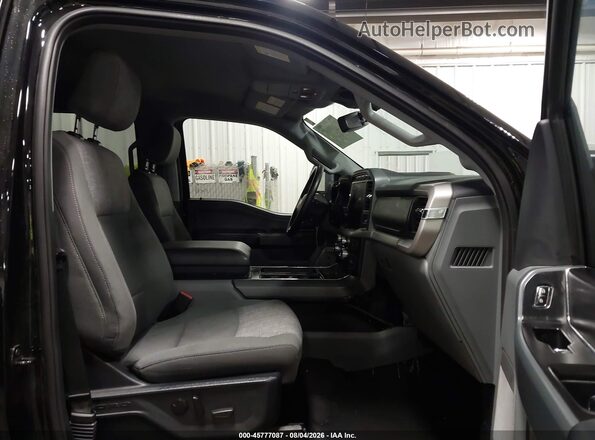 1FTFW1E84PFC32086 2023 FORD F150 Черный Вид салона спереди