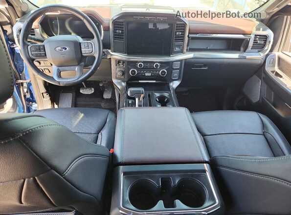 1FTFW1E86PKD13128 2023 FORD F150 Синий Вид панели приборов