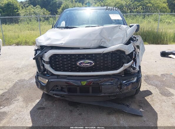1FTFW1E89PKF87987 2023 FORD F150 Gray Widok z przodu