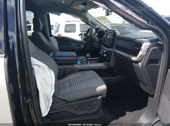 1FTFW1E89PKF87987 2023 FORD F150 Gray Widok wnętrza z przodu