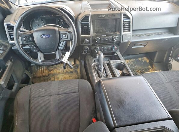 1FTFW1EG2GFA01856 2016 FORD F150 Black Dashboard view