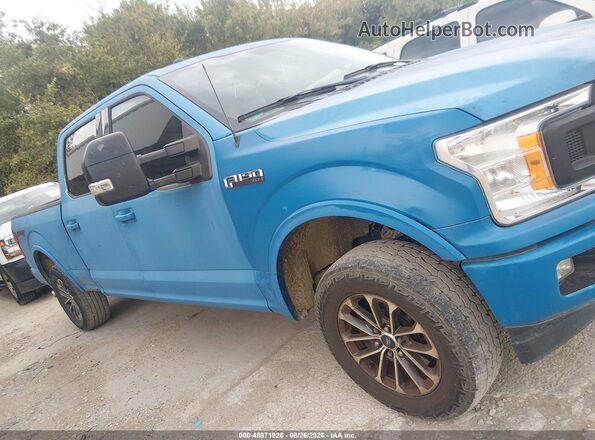 1FTFW1EG3JFD43338 2018 FORD F150 Blue Vista interior trasera