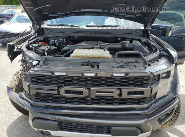 1FTFW1RG2PFC37708 2023 FORD F150 Черный Вид задней части салона