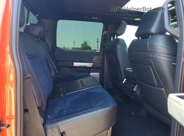 1FTFW1RG3PFC76484 2023 FORD F150 Orange Rear seats view
