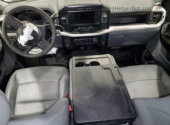 1FTFX1E57PKD98807 2023 FORD F150 Белый Вид панели приборов
