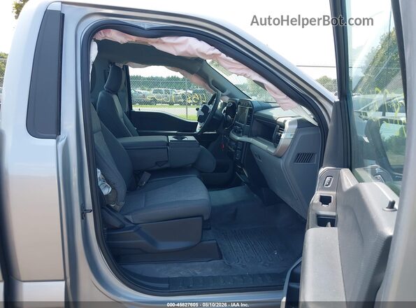 1FTMF1EP8PKD72275 2023 FORD F150 Silver Vista interior delantera