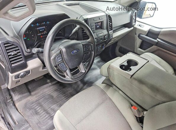 1FTMF1EP9LKE09229 2020 FORD F150 Черный Вид панели приборов