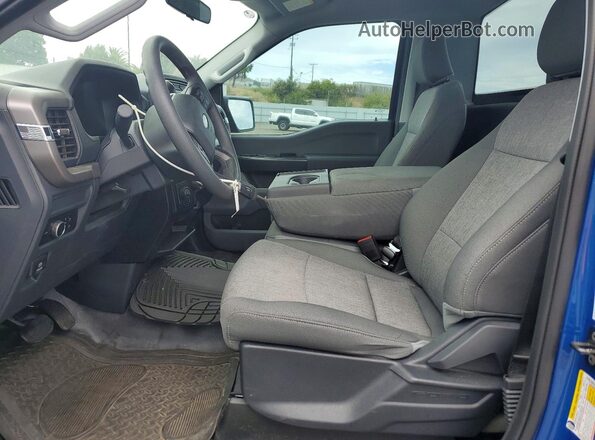 1FTMF1K56RKF02558 2024 FORD F150 Синий Вид салона спереди