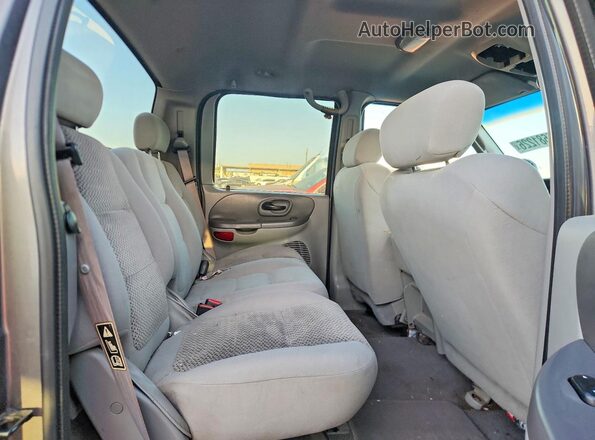 1FTRW07663KB38585 2023 FORD F150 Brown Vista de los asientos traseros