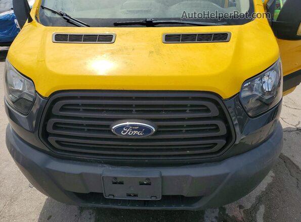 1FTYR1YM0HKA29083 2017 FORD TRANSIT Yellow Vista interior trasera