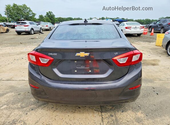 1G1BE5SM4G7309200 2016 CHEVROLET CRUZE Black Вид ззаду