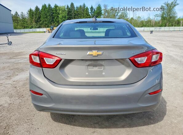 1G1BE5SM4J7234697 2018 CHEVROLET CRUZE Серебряный Вид сзади