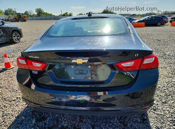 1G1ZD5ST2JF154233 2018 CHEVROLET MALIBU Black Rear view