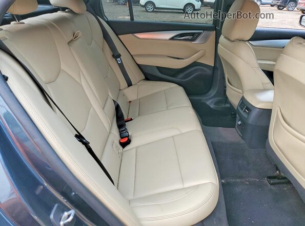 1G6DX5RK4M0116633 2021 CADILLAC CT5 Teal Rear seats view
