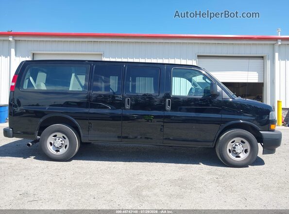 1GAWGEFGXJ1288878 2018 CHEVROLET EXPRESS Black Widok wnętrza z tyłu