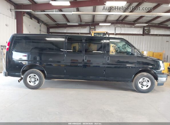 1GAZGPFG9J1299962 2018 CHEVROLET EXPRESS Black Vista interior trasera