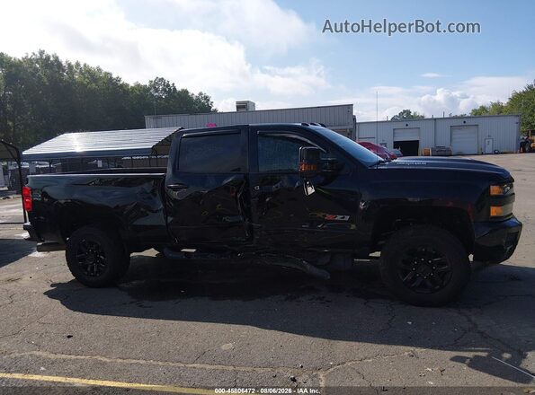 1GC1KWEY3JF180587 2018 CHEVROLET SILVERADO Black Widok wnętrza z tyłu