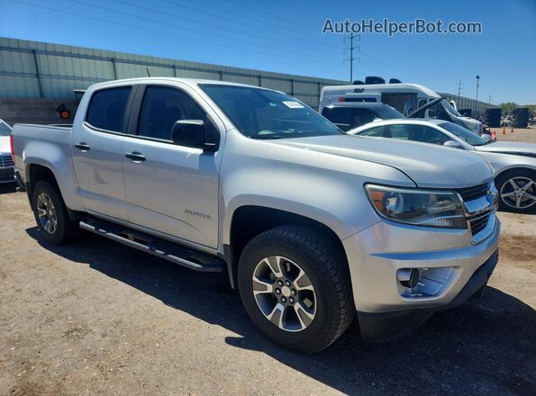 1GCGSBEA0J1186298 2018 CHEVROLET COLORADO Silver Вид салону спереду