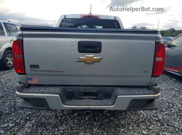 1GCGTCEN9J1294795 2018 CHEVROLET COLORADO Серебряный Вид сзади
