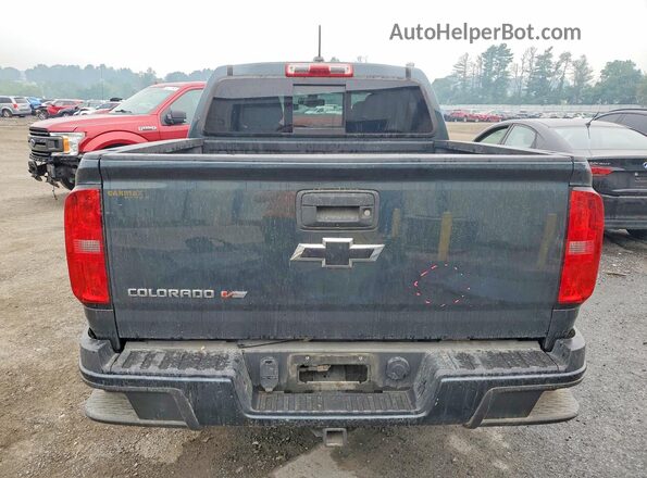1GCGTDEN2H1310111 2017 CHEVROLET COLORADO Серый Вид сзади