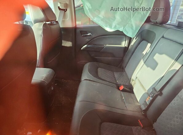 1GCGTDEN7J1158218 2018 CHEVROLET COLORADO Red Rear seats view