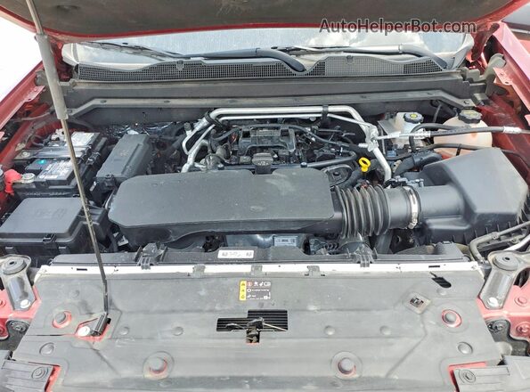 1GCPTBEK6T1120167 2026 CHEVROLET COLORADO Burgundy Widok wnętrza z tyłu
