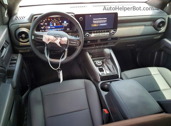 1GCPTEEK9T1107138 2026 CHEVROLET COLORADO Maroon Dashboard view
