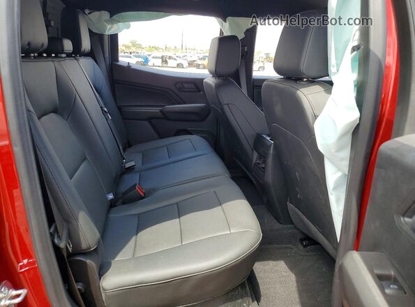 1GCPTEEK9T1107138 2026 CHEVROLET COLORADO Maroon Rear seats view