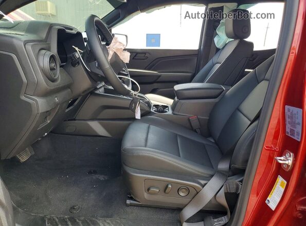 1GCPTEEK9T1107138 2026 CHEVROLET COLORADO Maroon Front interior view