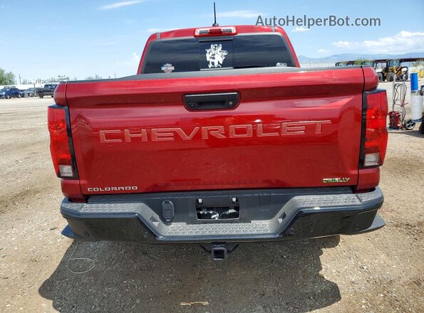 1GCPTEEK9T1107138 2026 CHEVROLET COLORADO Maroon Rear view