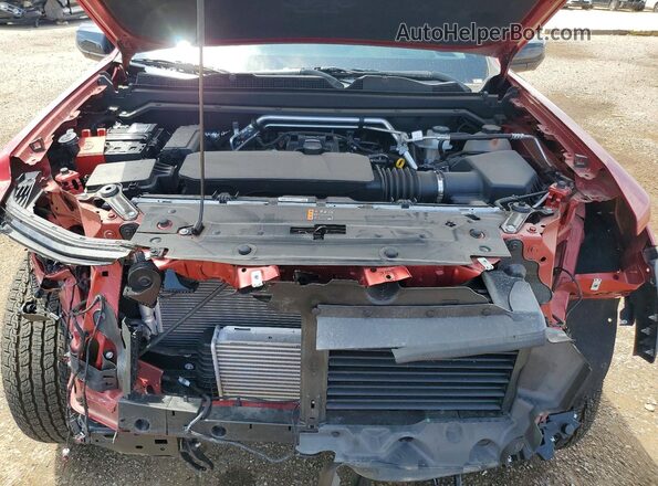 1GCPTEEK9T1107138 2026 CHEVROLET COLORADO Maroon Rear interior view