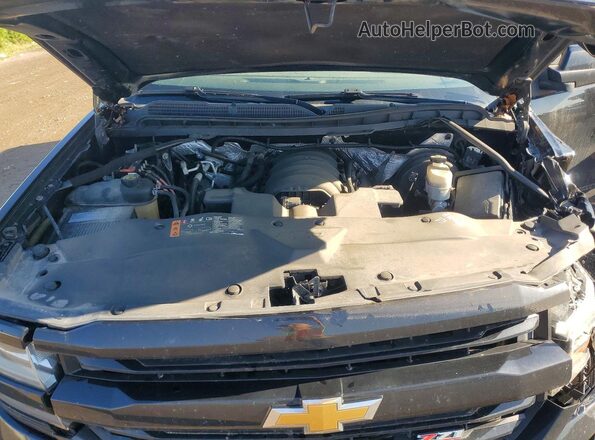 1GCVKREC1JZ146251 2018 CHEVROLET SILVERADO Black Widok wnętrza z tyłu