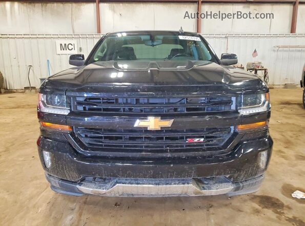 1GCVKREC1JZ206805 2018 CHEVROLET SILVERADO Black Front view
