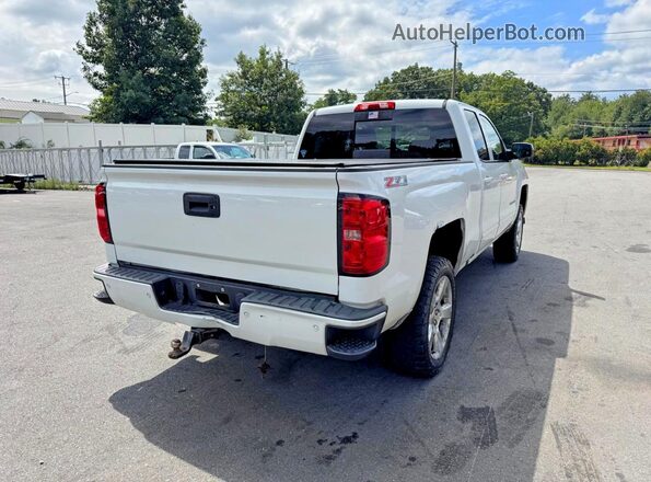 1GCVKREC4GZ112068 2016 CHEVROLET SILVERADO White Widok wnętrza z przodu