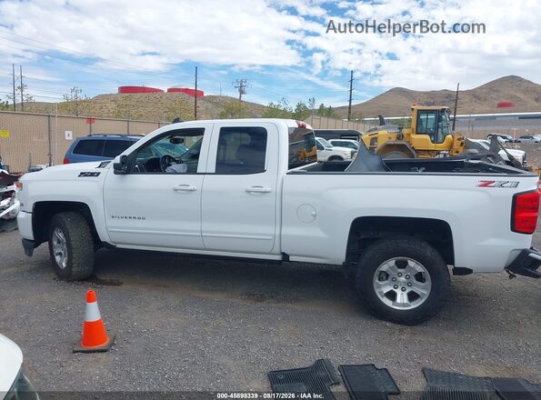 1GCVKREC5JZ166874 2018 CHEVROLET SILVERADO Белый Вид задней части салона