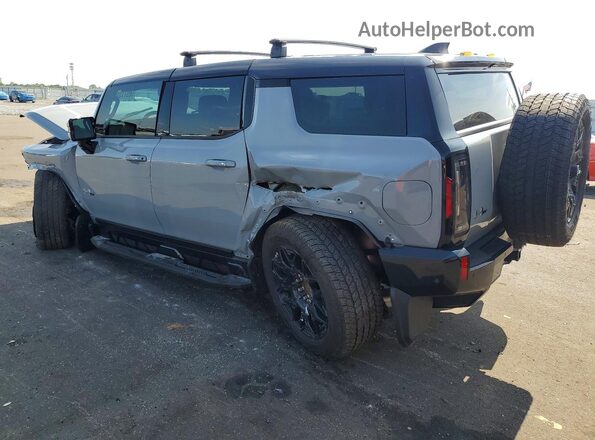 1GKB0NDE9RU107151 2024 GMC HUMMER Gray Trasero izquierdo