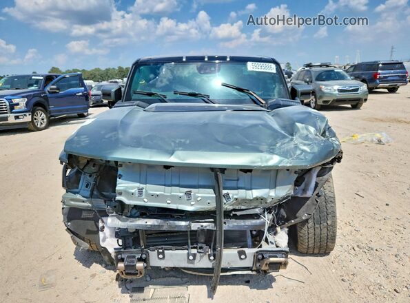 1GKB0RDC7RU100379 2024 GMC HUMMER Gray წინა ხედი